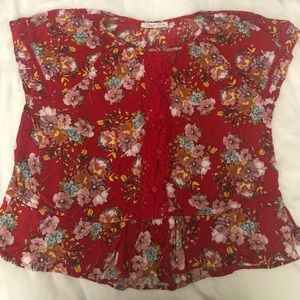 Floral red peplum style shirt.